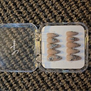 Elegant Nude Press-On Nails with Silver Accents